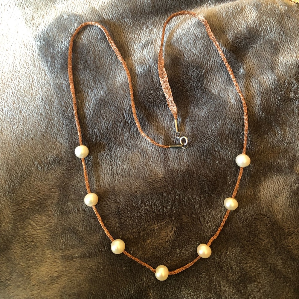 Fresh water pearl station necklace.